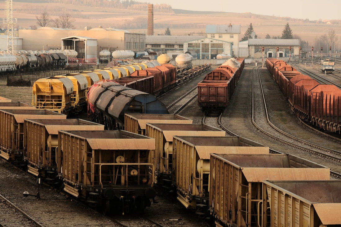 Freight train yard with multiple railroad tracks and freight cars - how to sleep when you are on call for railroad workers